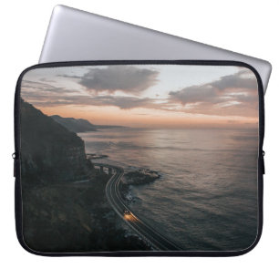 ROAD BESIDE BODY OF WATER LAPTOP SLEEVE