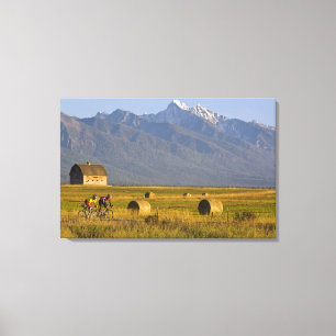 Road bicyclists race down back country road in canvas print
