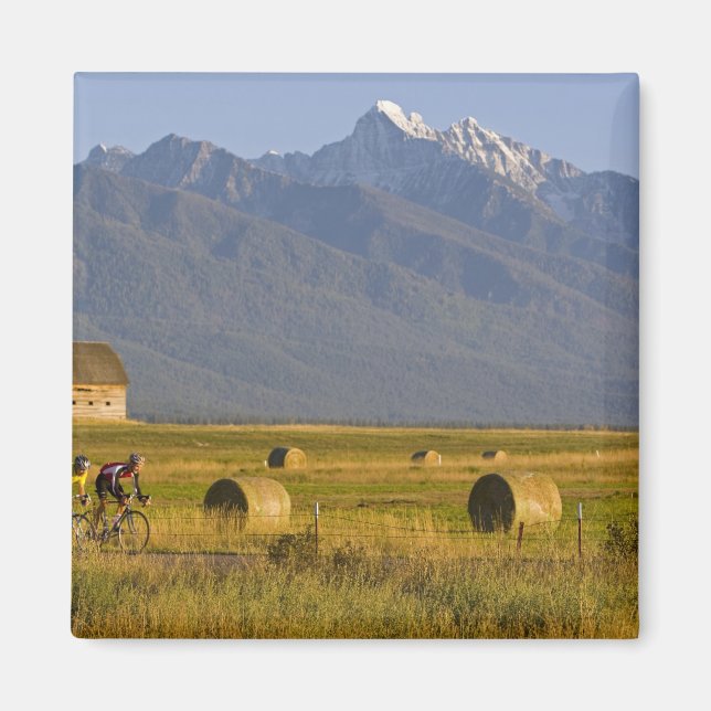Road bicyclists race down back country road in magnet (Front)