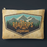 Road Trips & Shenanigans Outdoor Patch Zipper Bag<br><div class="desc">If you love road trips to National Parks, this zipper bag is for you! This fun road trip design features a National Parks inspired patch with a row of mountains and trees. The wording on this pouch reads "RoadTrips and Shenanigans" in orange. You can customize your bag with your name....</div>