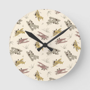 Roaring Art Deco Bi-planes - red yellow pattern. Round Clock