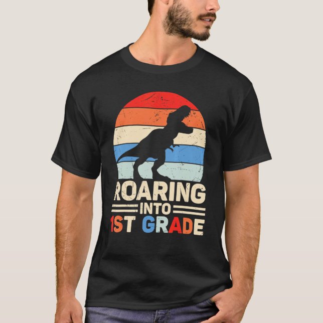 Roaring Into First Grade  Rex  Cute 1st Grade T-Shirt (Front)