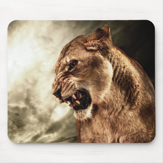 Roaring lioness against stormy sky mouse pad (Front)
