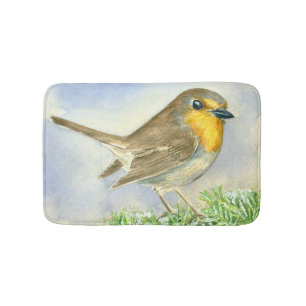 Robin bird on a frosted juniper branch bath mat