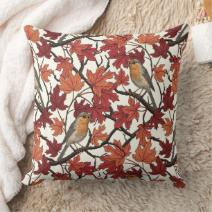 Robins in maple tree on off white cushion