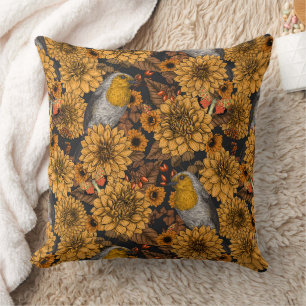 Robins in the autumn garden on black cushion