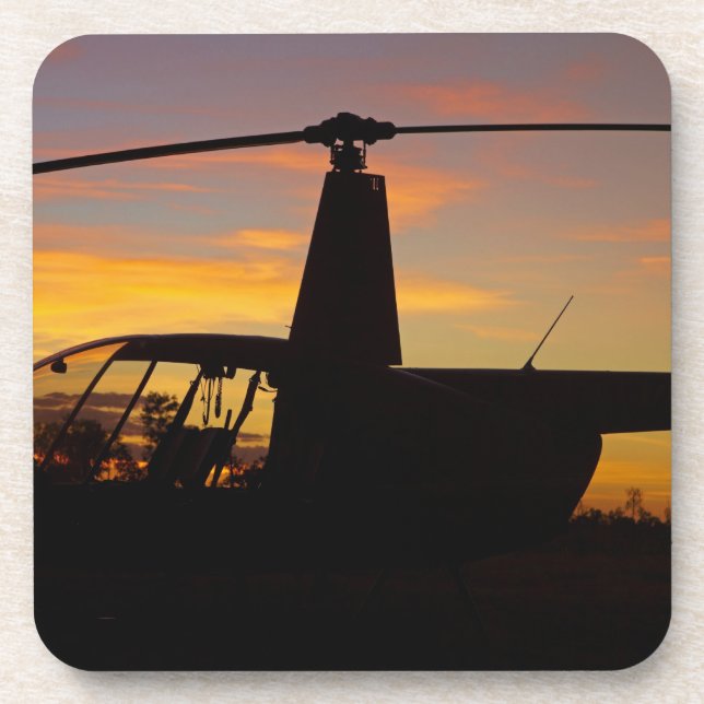 Robinson R44 helicopter at sunset Coaster (Front)