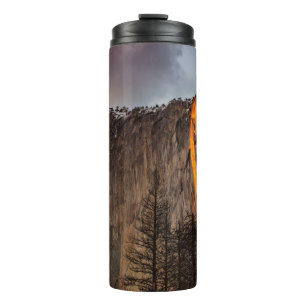 ROCK FORMATION WITH LAVA DURING DAYTIME THERMAL TUMBLER