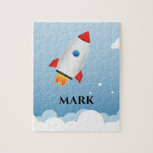 Rocket puzzle with child's name.