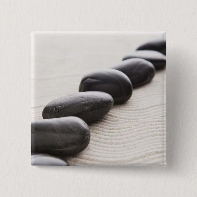 Rocks on sand 15 cm square badge (Front)