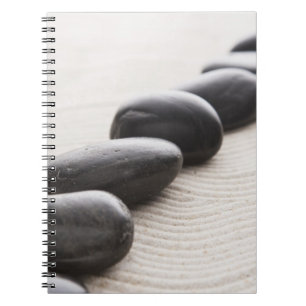 Rocks on sand spiral notebook