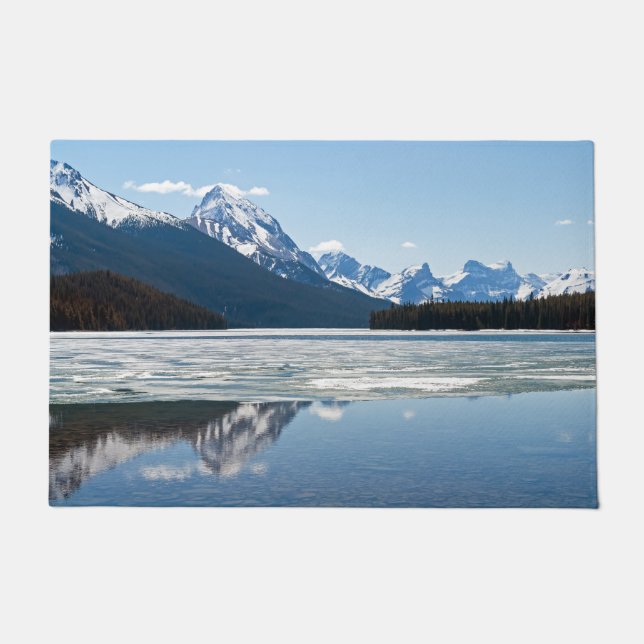 Rocky mountains reflecting in Maligne lake Doormat (Front)