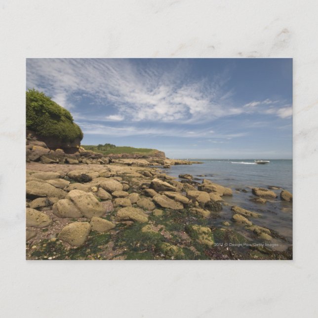 Rocky Seaside With Motorboat Travelling Postcard (Front)