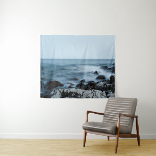 Rocky shore with misty water tapestry