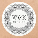 Rococo Couple's Initials Wedding or Save the Date Classic Round Sticker<br><div class="desc">Adorn your invitations, favours, or gifts with these captivating custom labels, featuring an exquisite circular border of ornate Baroque scrollwork. This artistic wreath beautifully frames your personalised monogram initials and an important date, adding a sophisticated and luxurious touch to any item. These high-quality, peel-and-stick labels offer ultimate convenience, providing a...</div>