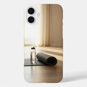 rolled yoga mat single water bottle on wood floor iPhone 16 plus case