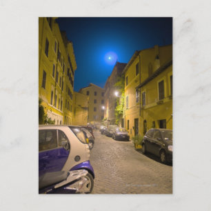Roman neighbourhood street at night postcard