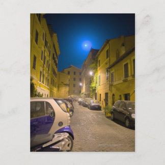 Roman neighbourhood street at night postcard