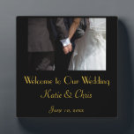 Romantic and Elegant Wedding Couple Holding Hands Plaque<br><div class="desc">Welcome to our wedding plaque. A romantic and elegant wedding photograph of a couple holding hands. The image focuses on the couples hands clasped together in love,  while wearing their fancy wedding attire. She in her wedding gown and he in his tux. Personalise with your own wedding details.</div>