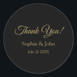 Romantic Black and Gold Wedding Thank You Classic Round Sticker<br><div class="desc">Shape: Classic Round Stickers Create custom stickers for every occasion! From special mailings and scrapbooking to kids’ activities and DIY projects, you’ll find these stickers are great for so many uses. Add your own designs, patterns, text, and pictures! Dimensions: Available in 2 sizes: Large: 3" diameter, 6 stickers per sheet...</div>
