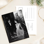 Romantic Black & White Newlywed Photo Christmas Postcard<br><div class="desc">Celebrate your first holiday season as newlyweds in elegant style with this "Romantic Black & White Newlywed Photo Christmas Postcard." Featuring a classic black-and-white design with a romantic couple in a sophisticated setting, this postcard is perfect for sharing your love and holiday cheer. The black tie theme and minimalist chic...</div>