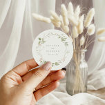 Romantic Blush & Green Floral Wreath Wedding Classic Round Sticker<br><div class="desc">Wedding stickers for envelopes or favours with a watercolor circular wreath of blush pink flowers and green leaves. Personalise with your names and wedding date in grey serif font.</div>