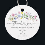 Romantic Boho Garden Wildflower Thank You Favour Tags<br><div class="desc">Add a heartfelt finishing touch to your wedding favours with these watercolor wildflower thank you tags. Featuring a spray of hand-painted blooms in pink, purple, yellow, and blue with elegant script that reads “thank you, ” this round tag is personalised with your names and wedding date. Perfect for attaching to...</div>