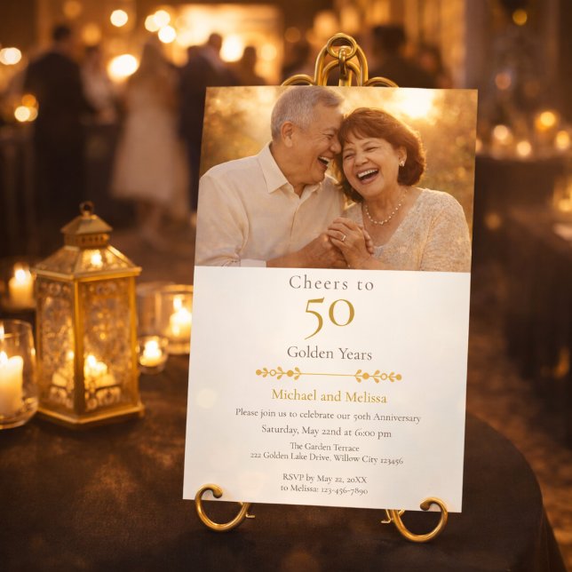 Romantic Cheers to 50 Years Gold Invitation (Elegant gold anniversary invite displayed at a romantic candlelit venue entrance)