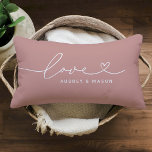 Romantic Dusty Rose Love Heart Couple Names Lumbar Cushion<br><div class="desc">A romantic dusty rose lumbar pillow featuring Love in flowing white heart script with customisable couple names. The white-on-dusty-rose design brings a warm,  feminine accent perfect for wedding gifts,  anniversaries,  or newlywed home styling. All text is fully editable to personalise with any couple's names.</div>