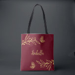 Romantic elegant gold flower burgundy tote bag<br><div class="desc">Unique simple tote bag featuring romantic and elegant gold flowers on burgundy background
FOR MORE MATCHING PRODUCTS click on the collection above or contact me.</div>