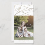 Romantic Gold Believe Photo Family Newsletter Holiday Card<br><div class="desc">This romantic gold believe photo family newsletter holiday card is the perfect simple holiday greeting. The modern classic design features fancy swirls and whimsical flourishes with gorgeous elegant hand lettered faux champagne gold foil typography. Personalise the front of the card with a photo, your family name and the year. Include...</div>