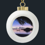 Romantic Maldives Tropical Sunset<br><div class="desc">This beautiful round ornament is decorated with a sunset image of Maldives in one of the remote islands with a palm tree in the foreground. There is a row of water bungalows and a gondola in the background bathing in the glow of the setting sun.</div>