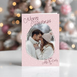 Romantic Pink Doodle Photo Merry Christmas Folded Holiday Card<br><div class="desc">Celebrate the magic of the season with this whimsical pink personalised folded Christmas photo card. Featuring a charming snowfall background in pale pink and cream and a playful handwritten "Merry Christmas" text with a hand drawn frame for your favourite photo, this romantic holiday greeting card is perfect for sharing love...</div>