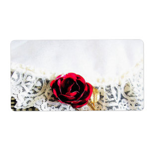 Romantic red rose and white lace