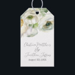 Romantic Watercolor White Ranunculus Gift Tags<br><div class="desc">These romantic floral gift tags feature a simple and elegant white background with watercolor ranunculus flowers. A delicate bouquet of ranunculus and greenery is pictured on the top. Sample names of a newlywed couple and wedding date are printed below. You can personalise the gift tags to include your own custom...</div>