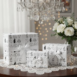 Romantic Wedding Day Icon Wrapping Paper<br><div class="desc">Make every wedding, engagement, or anniversary gift even more special with this beautifully romantic wrapping paper. The elegant black-and-white design features a collection of charming, hand-drawn wedding icons—from the wedding car to the rings and wedding cake—all telling a beautiful love story. This unique and sophisticated gift wrap is the perfect...</div>