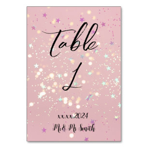 Romantic wedding flowers blooming garden table number