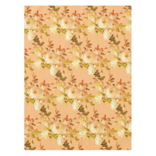 Romantic white roses on orange tablecloth