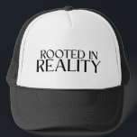 Rooted In Reality Minimalist Typewriter  Trucker Hat<br><div class="desc">Keep a clear head. A classic mesh-back trucker hat featuring a bold typographic statement for those who stay anchored in the real world.</div>