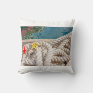 rope for mooring with two starfish on pillow