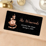 Rose Gold and Black Christmas Ornament Label<br><div class="desc">This elegant and chic address label features a rose gold ribbon Christmas tree with a bauble ornament. The text combines handwritten script and modern sans serif fonts for a classy and sophisticated look. The falling snow, snowflakes and sparkles give a festive and magical touch. This is perfect for Christmas and...</div>