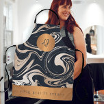 Rose gold black marble pattern salon name monogram apron<br><div class="desc">Trendy modern art glamourous marble abstract painting in beige tan ivory, faux rose gold glitter, black and blush with gold copper metallic geometric shapes making an elegant professional monogrammed apron suitable for a beauty salon employee, makeup artist, hairstylist, beautician, painter. Perfect choice for an elegant stylish sophisticated look. Easy to...</div>