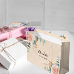 Rose gold floral peach cream bridesmaid large gift bag<br><div class="desc">A peach,  cream coloured background.  Decorated with watercolored rose gold roses,  eucalyptus greenery and golden sprigs. 
Personalise and add the name of your bridesmaid.</div>