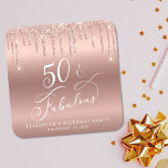 Rose Gold Glitter 50th Birthday Party Square Paper Coaster<br><div class="desc">Chic custom 50th birthday party coaster featuring "50 & Fabulous" in a calligraphy script,  a rose gold faux foil background and dripping rose gold faux glitter. Perfect for table decor that guests can take home as a souvenir party favour.</div>