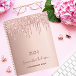 Rose gold glitter pink appointment book 2021 glam planner<br><div class="desc">IN 2021 YOU WILL RECIVE A NOTIFICATION THAT YOU'LL HAVE TO REVIEW NUMER 21 IN RED. THIS IS OK AND YOU DON'T HAVE TO DO ANYTHING. A faux rose gold metallic looking background with elegant rose gold and pink faux glitter drips, paint dripping look. Template for a year. Personalise and...</div>