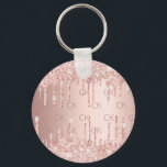 Rose gold monogram initials glitter drips key ring<br><div class="desc">A rose gold faux metallic looking background and dark rose gold letters. Decorated with faux glitter drips,  paint dripping look. Personalize and add monogram initials. Your monogram initials as background pattern.</div>