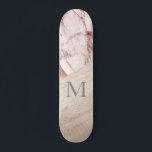 Rose Gold Pink Marble Wood Girly Chic Monogram  Skateboard<br><div class="desc">Presenting our Rose Gold Pink Marble Wood Girly Chic Monogram Skateboard—an inspired creation designed to capture the essence of skater girls everywhere. This personalised skateboard combines elements of elegance and playfulness, featuring a beautiful rose gold hue, pink marble texture, and wood accents. The addition of a monogram adds a personal...</div>