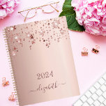 Rose gold stars dripping blush glamourous 2025 planner<br><div class="desc">A faux rose gold background with elegant faux rose gold glittery and shining stars falling, dripping. Personalise and add a year and a name. The name is written in dark rose gold with a large modern hand lettered style script with swashes. To keep the swashes only delete the sample name,...</div>