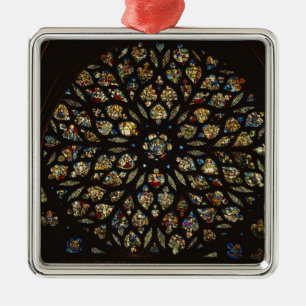 Rose window above the west door, with scenes depic metal tree decoration