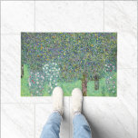 Rosebushes Under The Trees, Gustav Klimt Doormat<br><div class="desc">Gustav Klimt (July 14, 1862 – February 6, 1918) was an Austrian symbolist painter and one of the most prominent members of the Vienna Secession movement. Klimt is noted for his paintings, murals, sketches, and other objets d'art. In addition to his figurative works, which include allegories and portraits, he painted...</div>